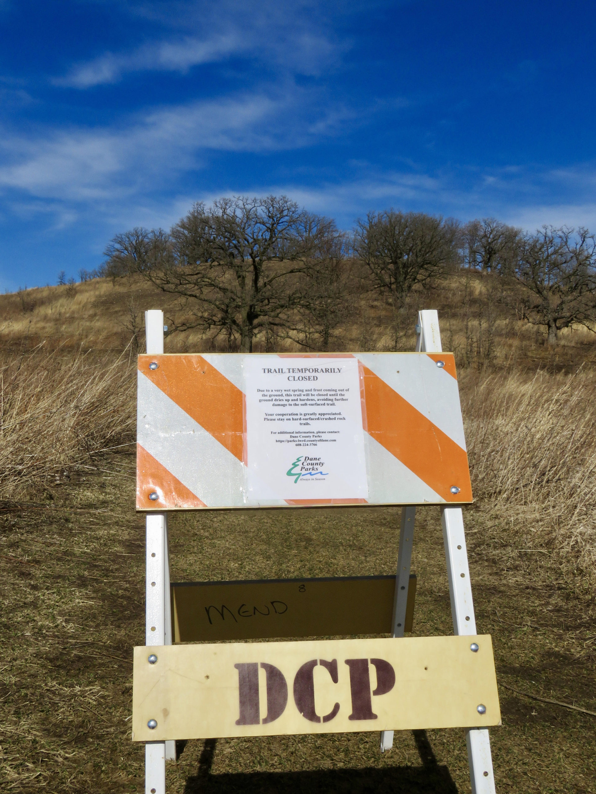 Dane County Parks trail closed sign, seasonal