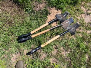 “Parsnip Predators”— a specially modified shovel designed to help sever the main root of a plant