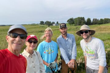 Weed Warriors removing invasive species at the Conservancy