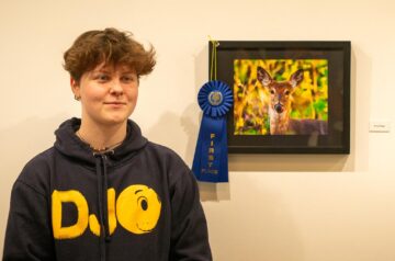 Middleton High School student Rune Balge with his winning photo in the annual Friends of Pheasant Branch photo contest