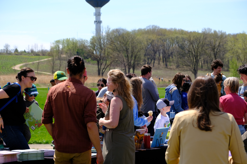 Large crowd at the Celebrating Books and Trees event at Orchid Heights Park in Middleton Wisconsin