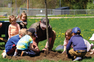 Tree planting at Celebrating Books & Trees event at Pheasant Branch Conservancy